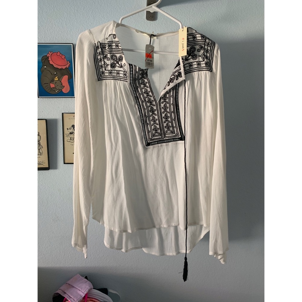 White embroidered print top